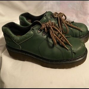 Green well loved Dr Martens.